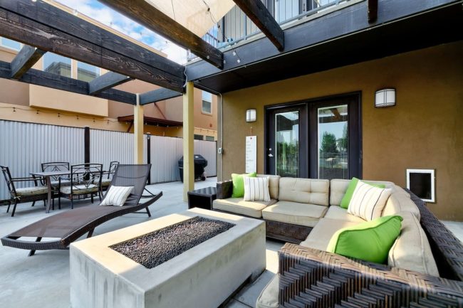 Back patio with fire place in a listed rental home in Boise, Idaho